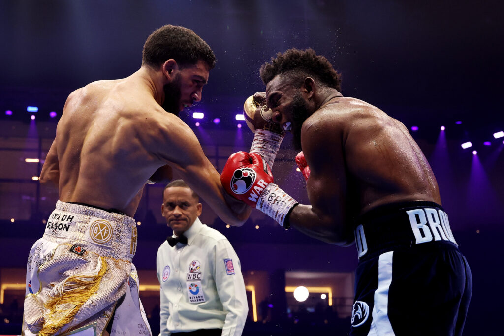 Hamzah Sheeraz lands a right uppercut on the face of Carlos Adames