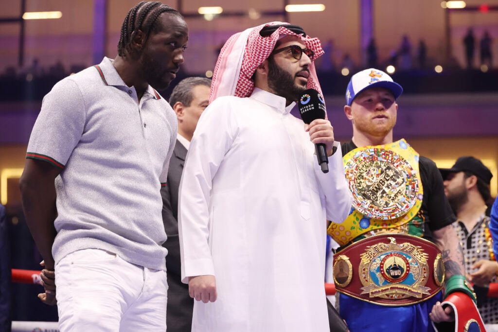 Canelo Alvarez and Terence Crawford face off in the ring after Canelo's win over William Scull