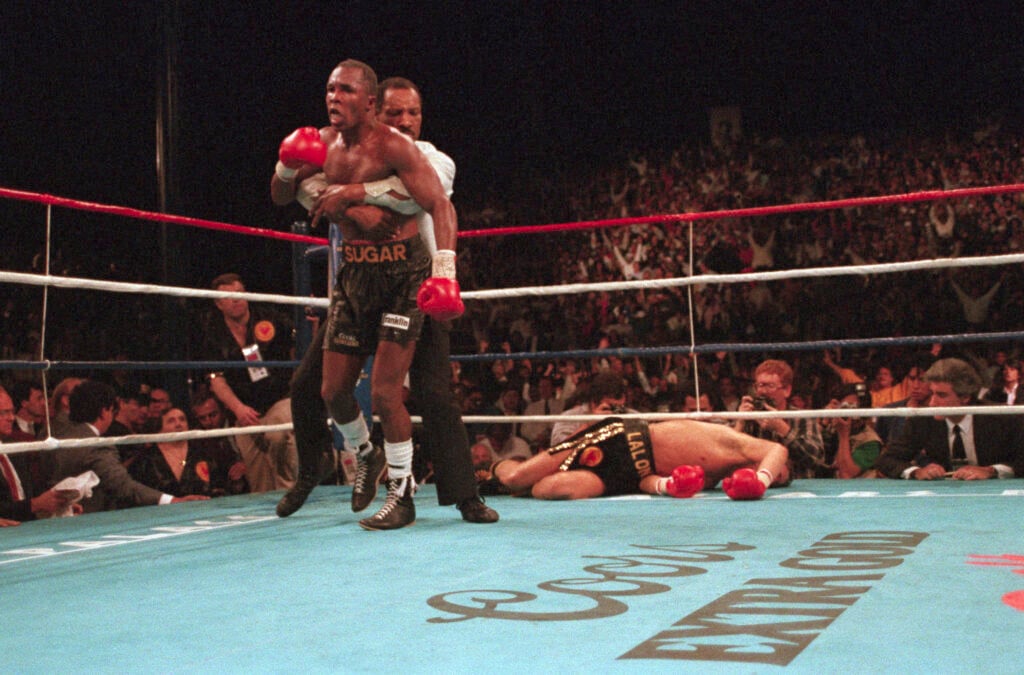 Referee Restraining Sugar Ray Leonard
