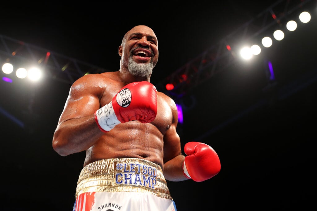 Shannon Briggs celebrates after defeating Emilio Ezequiel Zarate