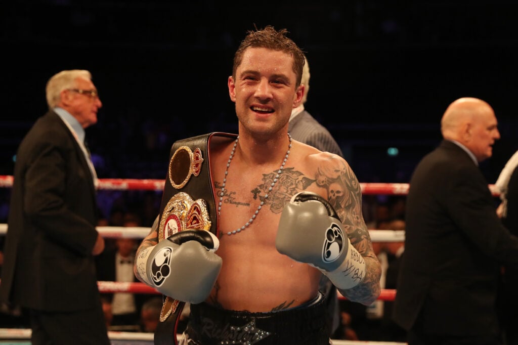 Ricky Burns celebrates defeating Kiryl Relikh