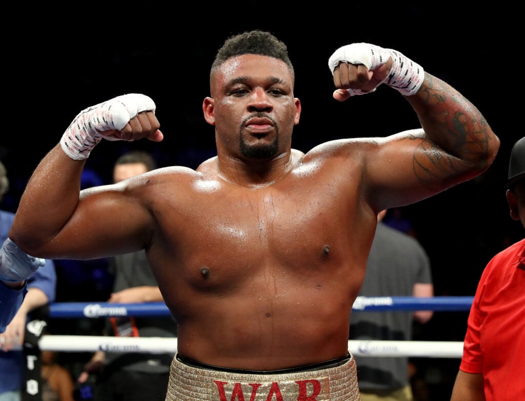 Jarrell Miller flexes his arms after beating Gerald Washington