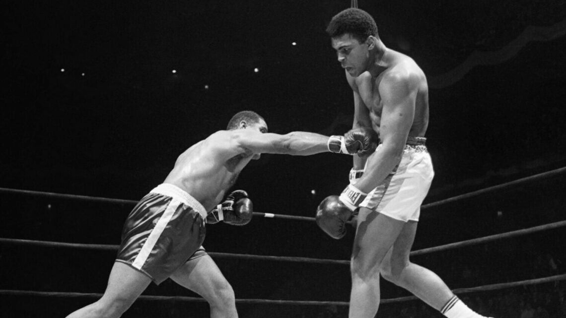 Muhammad Ali being punched by Zora Folley