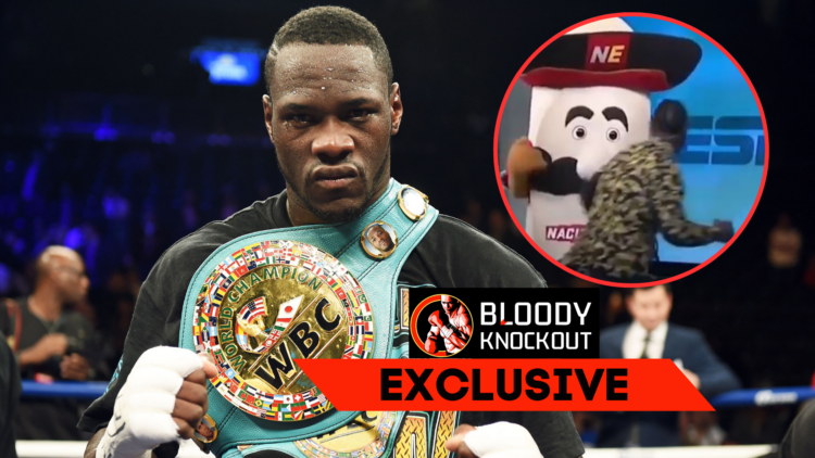Deontay Wilder celebrates defeating Artur Szpilka with an inset of him punching the ESPN mascot with exclusive banner