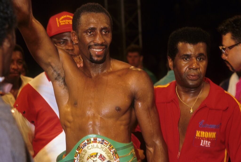 Thomas Hearns celebrates defeating James Shuler