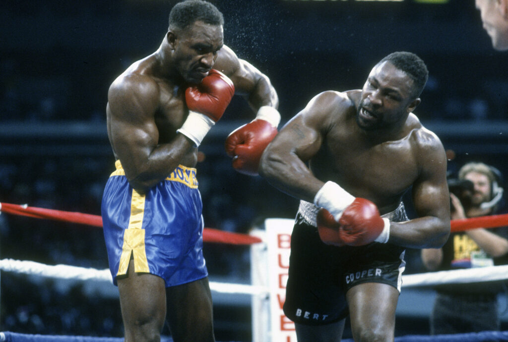 WBC, WBA and IBF Heavyweight Tittle Fight - Evander Holyfield v Bert Cooper