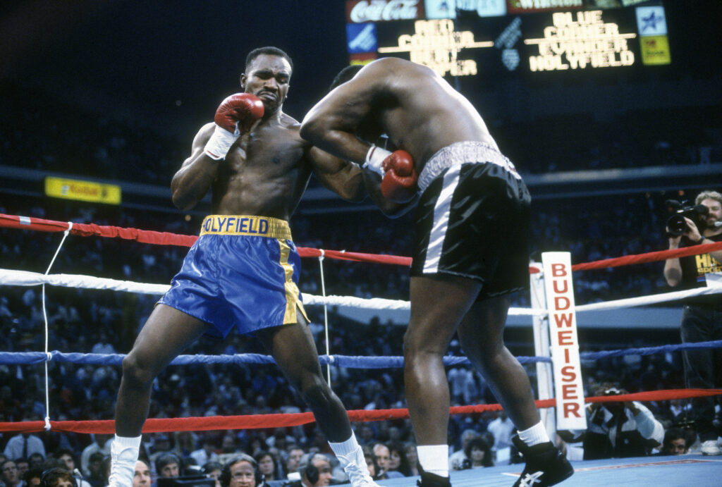 WBC, WBA and IBF Heavyweight Tittle Fight - Evander Holyfield v Bert Cooper