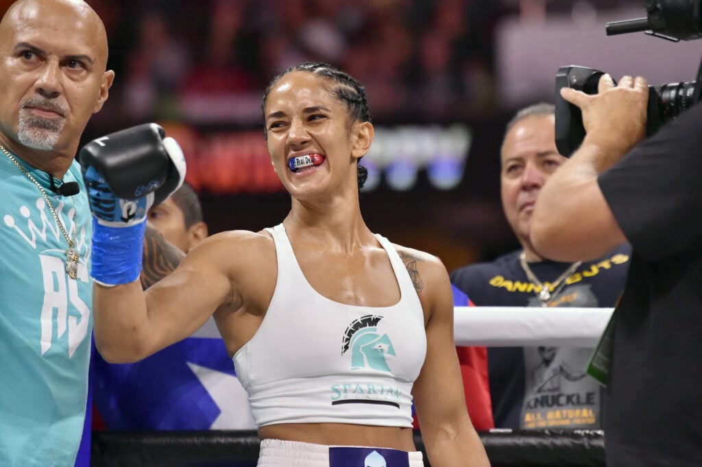 Amanda Serrano celebrates after win