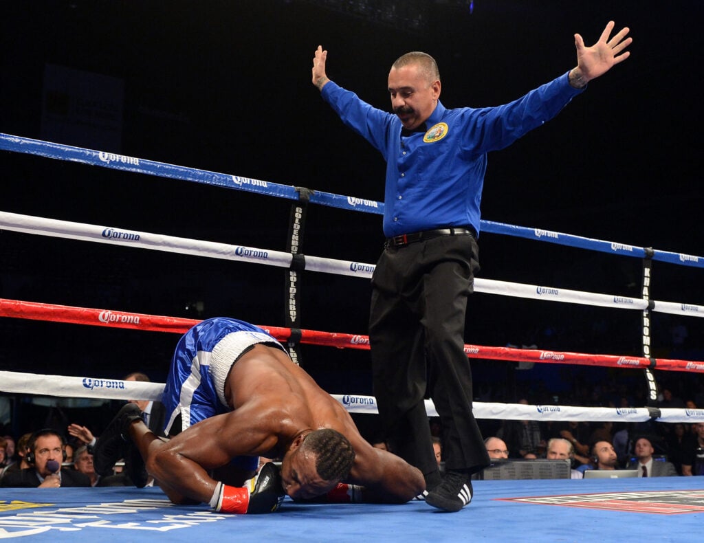 Kelvin Price lays flat in the ring after a knockout punch from Deontay Wilder