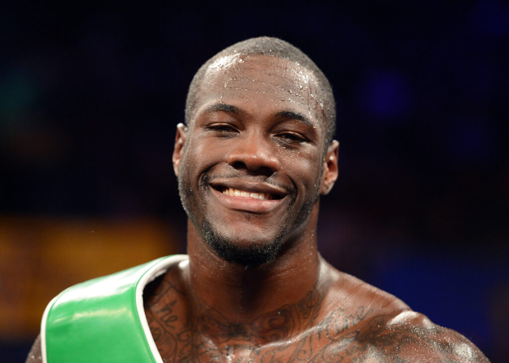 Deontay Wilder celebrates defeating Kelvin Price