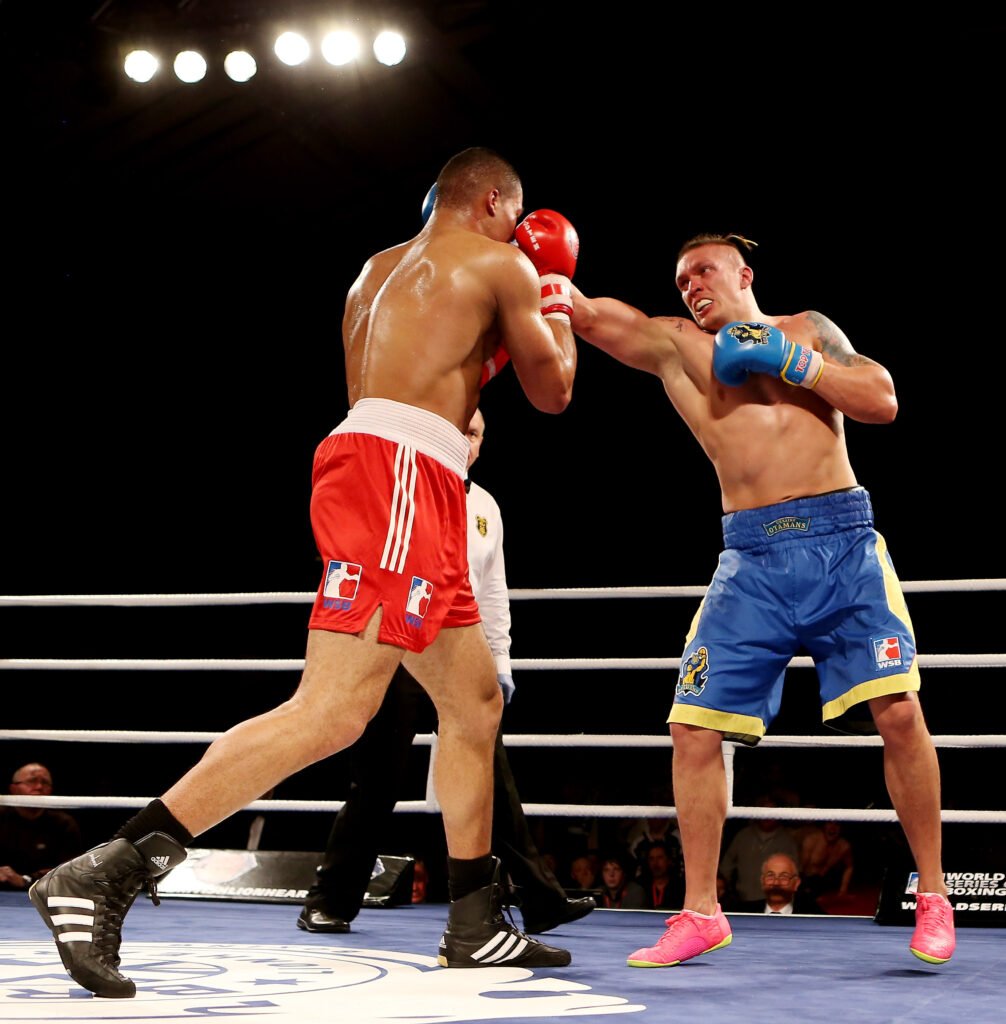 Oleksandr Usyk lands a straight left hand on Joe Joyce during their amateur World Series bout