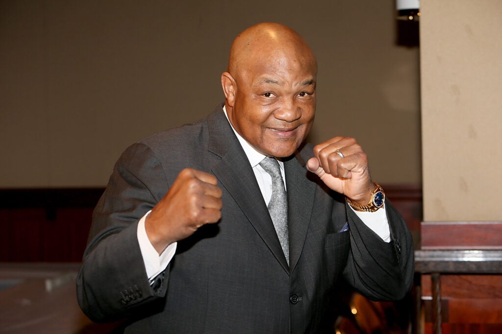 George Foreman poses for photo
