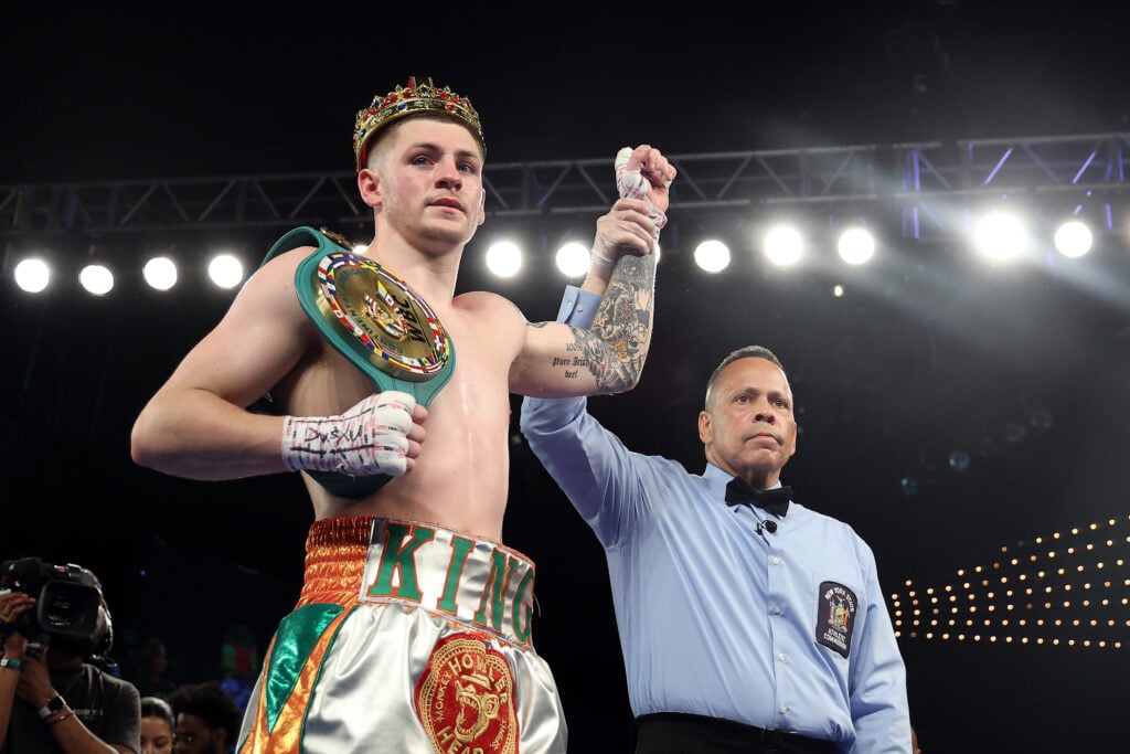 Callum Walsh gets his arm raised in victory