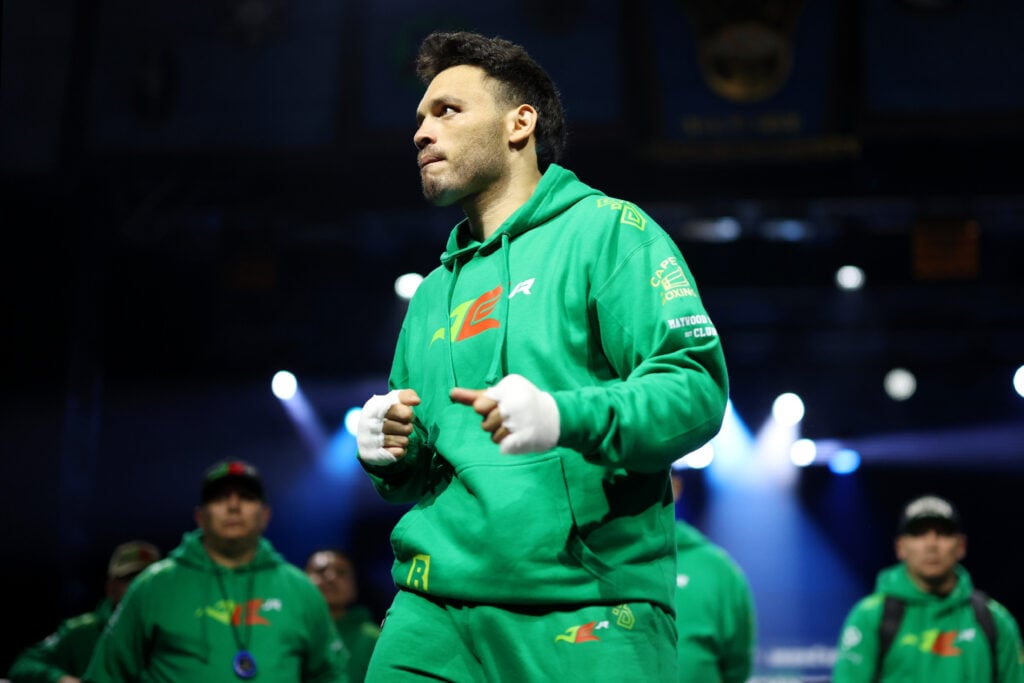 Julio Cesar Chavez Jr. in a green tracksuit at the Media Workout for his fight with Jake Paul