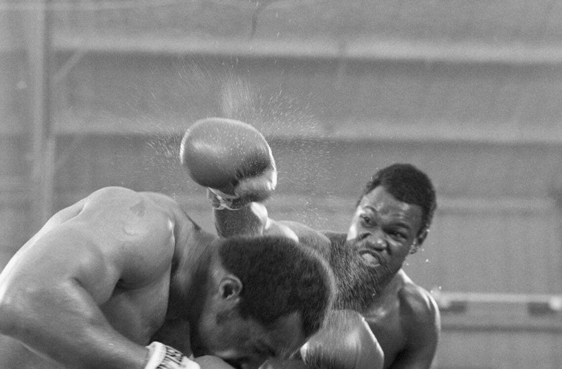 (Original Caption) 6/10/1978-Las Vegas, NV- WBC heavyweight champion Larry Holmes (r) is shown on his way to the title during the final rounds of h...