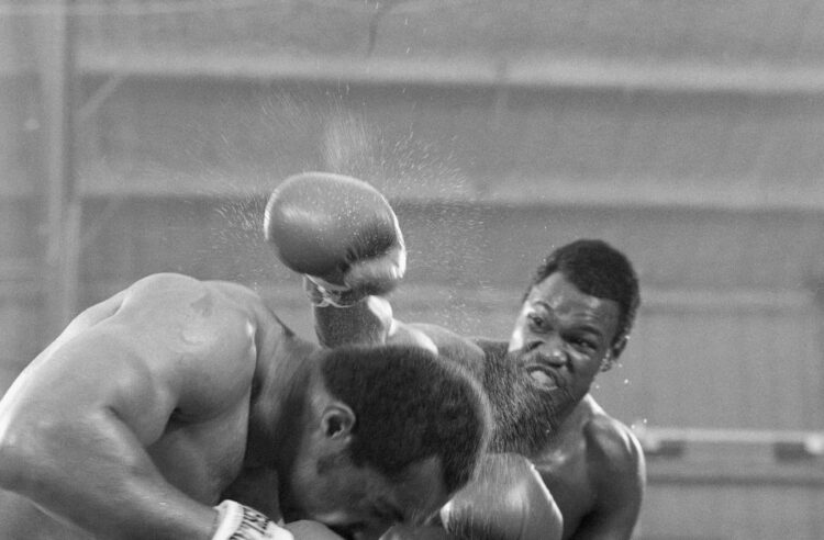 (Original Caption) 6/10/1978-Las Vegas, NV- WBC heavyweight champion Larry Holmes (r) is shown on his way to the title during the final rounds of h...