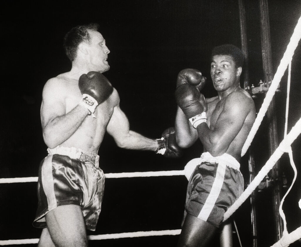 Henry Cooper Pinning Muhammad Ali on the Ropes
