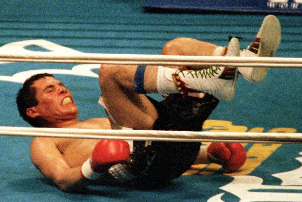 Julio Cesar Chavez on the canvas after being dropped