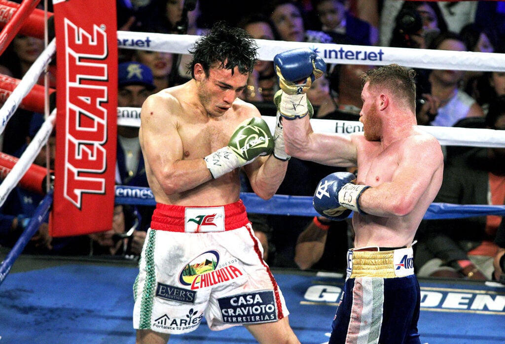 Canelo lands an uppercut on Julio Cesar Chavez Jr.