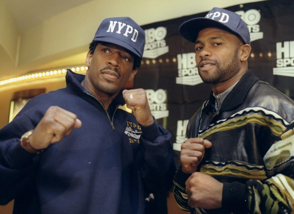 Richard Frazier of the NYPD, and boxer Roy Jones Jr. on hand