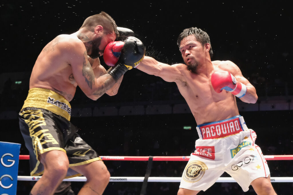 Manny Pacquiao lands a right jab on Lucas Matthysse