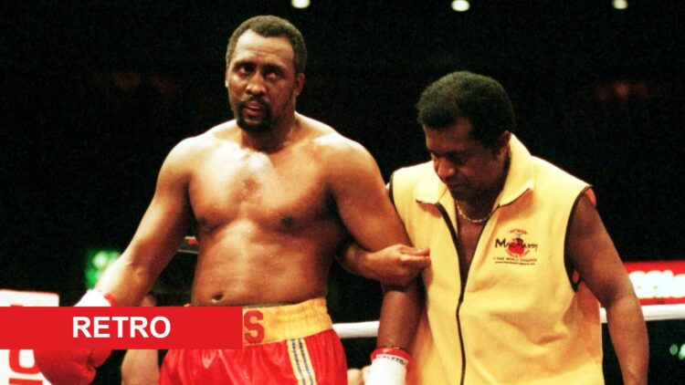 Thomas Hearns with Emanuel Steward after loss to Uriah Grant with retro banner