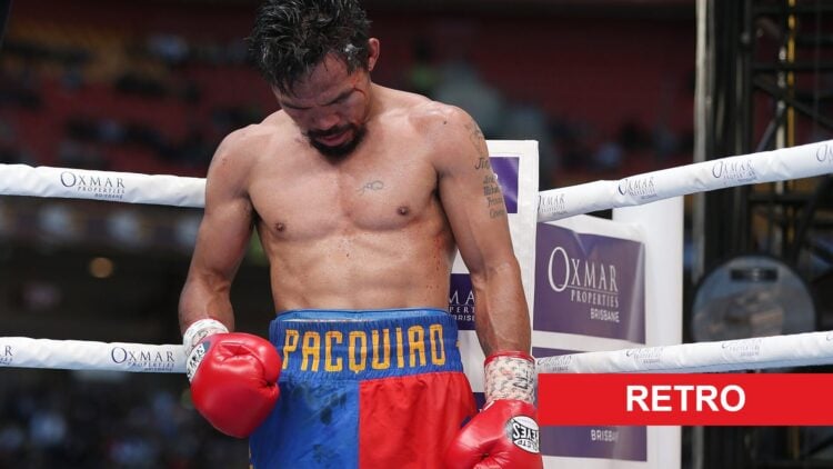 Manny Pacquiao of the Philippines walks back to his corner during the WBO World Welterweight Title Fight against Jeff Horn