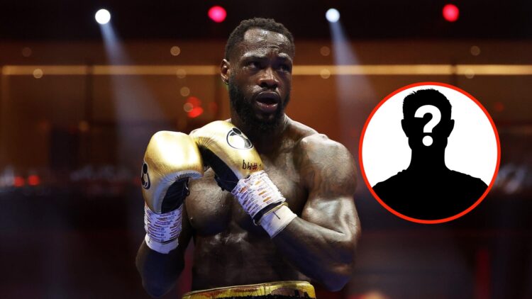 Deontay Wilder stands in the ring with his golden gloves up during his fight with Zhilei Zhang with a mystery overlay to the right of the frame