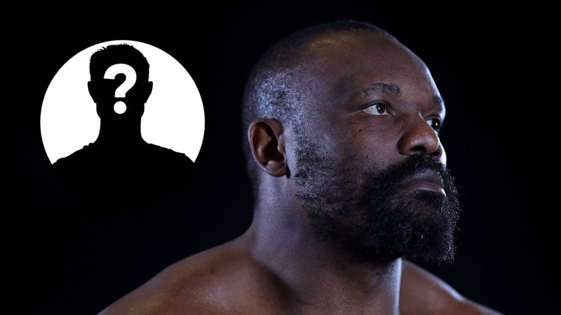 Derek Chisora poses with inset of mystery silhouette