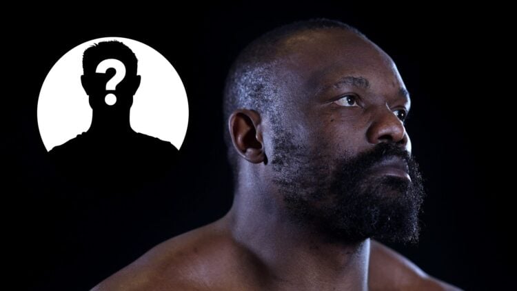 Derek Chisora poses with inset of mystery silhouette