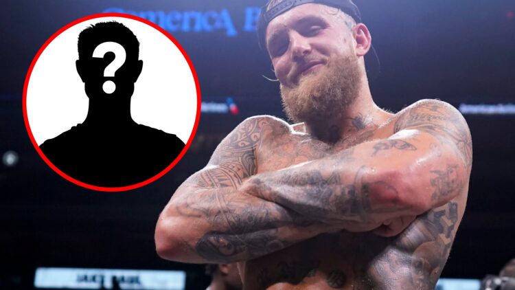 Jake Paul poses with his arms crossed after beating Nate Diaz with inset of mystery silhouette