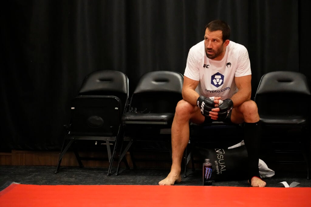 Luke Rockhold sitting down in changing room prior to fight