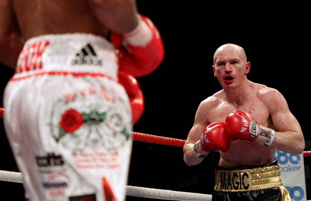 A bloodied Matthew Hatton looks on at Kell Brook during their fight