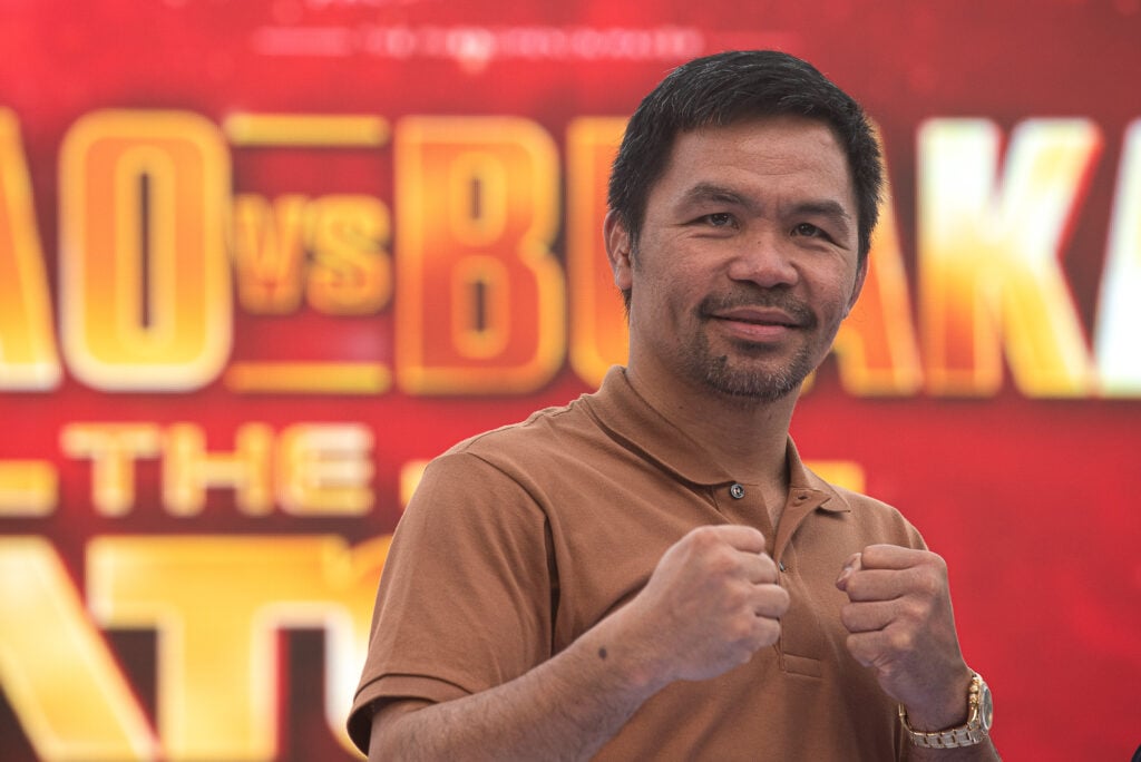 Manny Pacquiao poses at a press conference