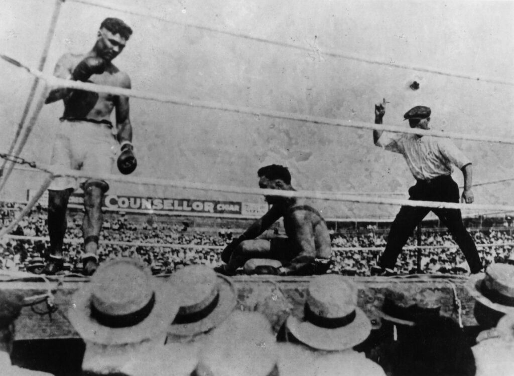 Jack Dempsey drops Jess Willard