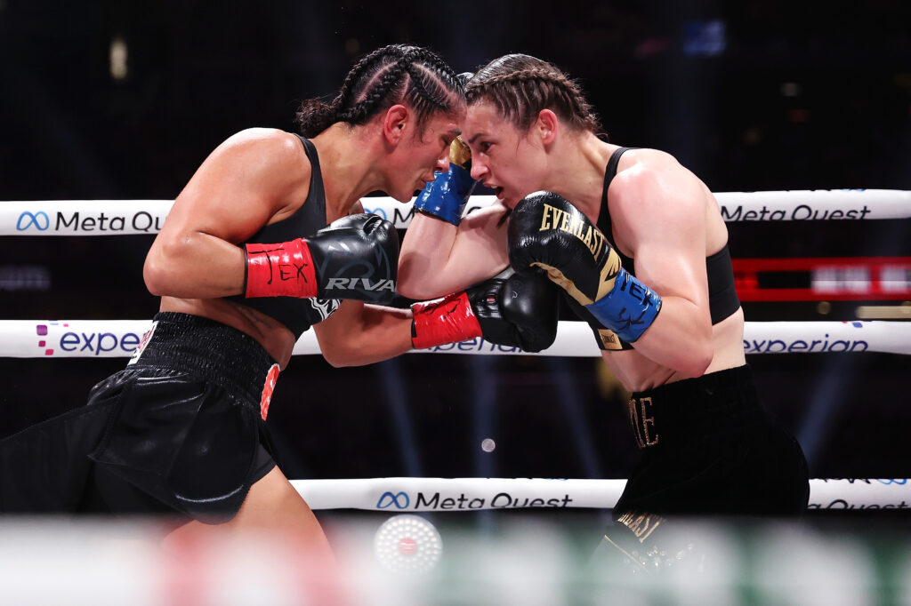 Katie Taylor and Amanda Serrano fighting in the pocket during their rematch