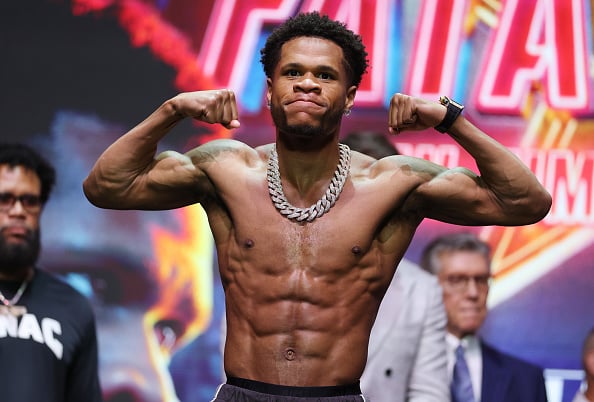 Devin Haney poses at weigh-in