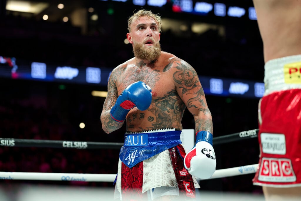 Jake Paul looking at his opponent while boxing Julio Cesar Chavez Jr.