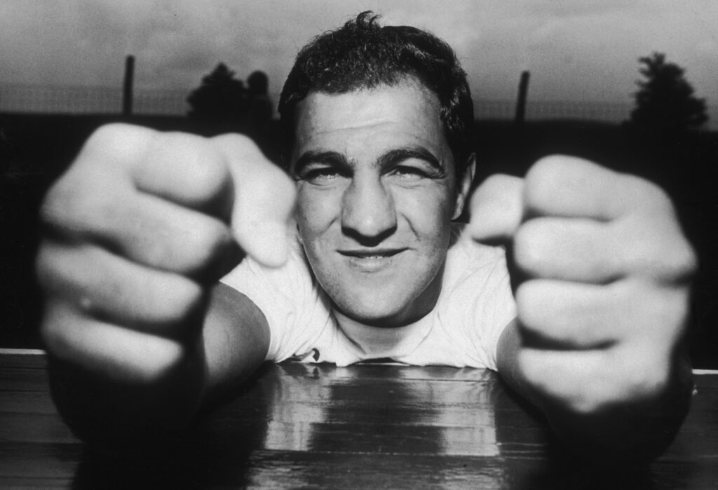 Rocky Marciano clenching his fists