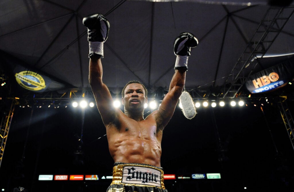 Shane Mosley celebrates defeating Ricardo Mayorga