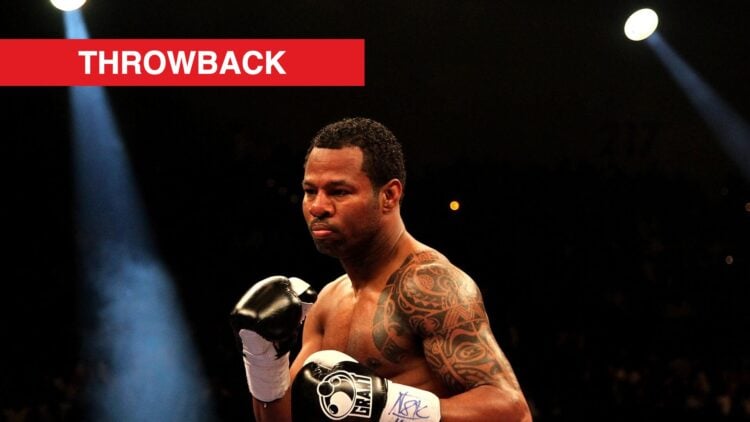 Shane Mosley stands with a black back drop and his hands in guarded position during his fight with Floyd Mayweather