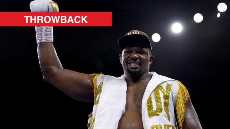Dillian Whyte raising his hand in victory with throwback label