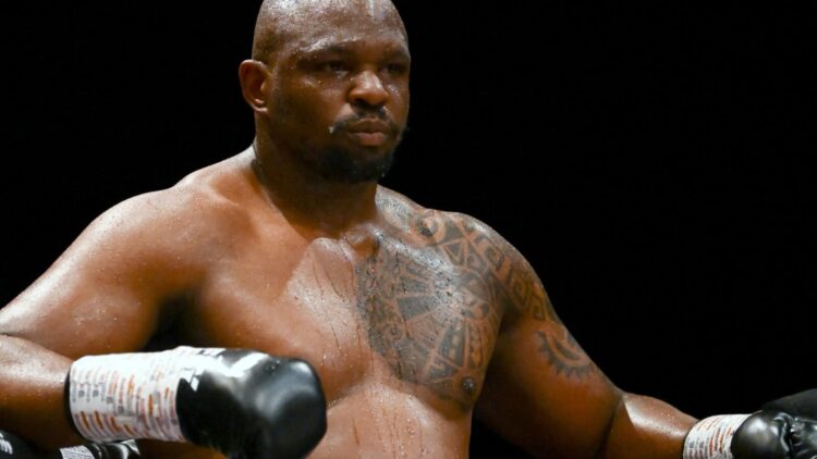 Dillian Whyte resting on the corner of the ring during a fight