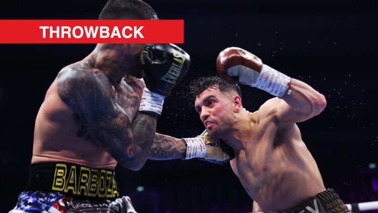 Image of Jack Catterall throwing punch at Arnold Barboza Jr with throwback label