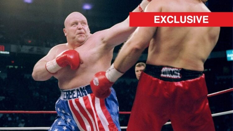 Butterbean wearing US flag colored shorts throws a straight left at Curt Allen