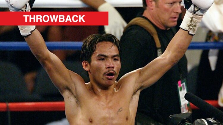Manny Pacquiao raises his arms to celebrate TKO win over Jorge Julio