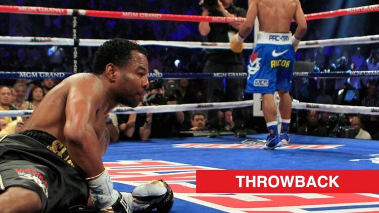 Manny Pacquiao walks away after dropping Shane Mosley to the canvas