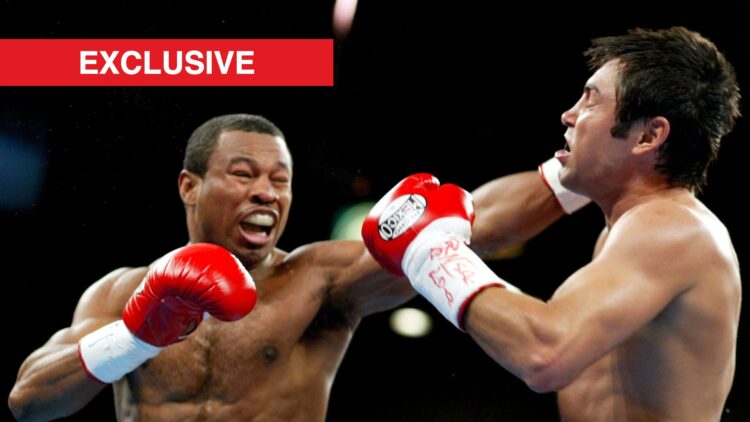 Shane Mosley throws a straight left hand at Oscar De La Hoya in their fight