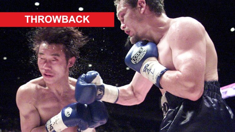 Julien Lorcy punches Takanori Hatakeyama with a right hook as sweat flies into the air during their 2001 title fight in Japan with a red rectangle ...
