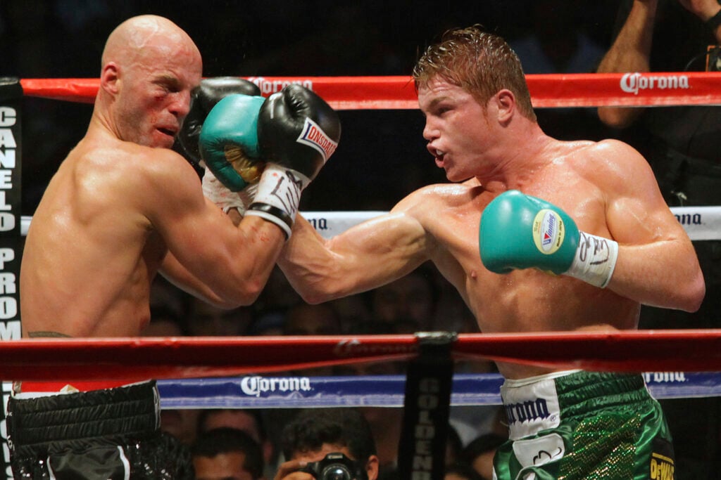 Canelo lands an uppercut on Ryan Rhodes
